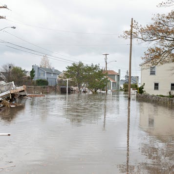 Damaged houses and flooded streets after Hurricane Sandy