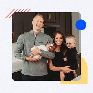 A young family. Father, mother, young daughter, and a baby.