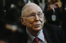 Charlie Munger, vice chairman of Berkshire Hathaway Inc., speaks to members of the media