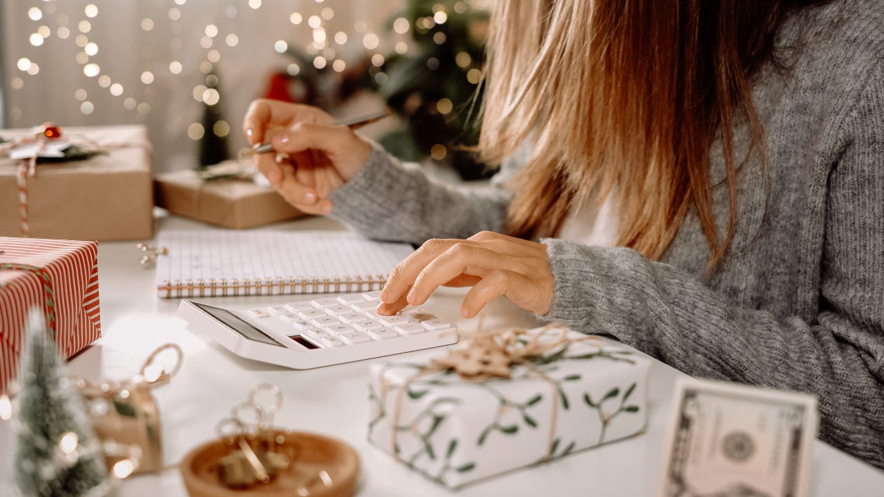 Woman working on finances during the holiday season