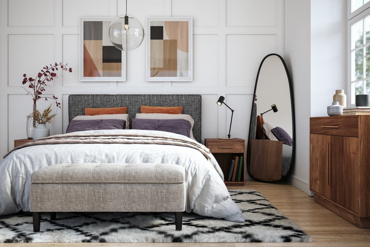 staged bedroom with modern furniture and bright window