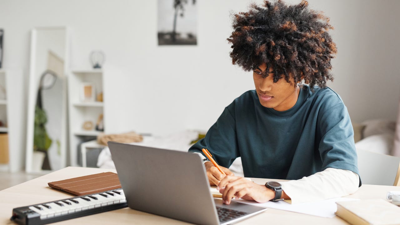 Young man studying basic financial principals