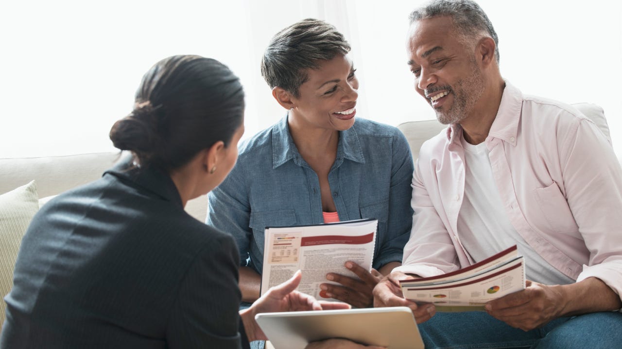 couple talking to financial planner