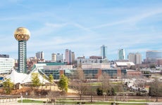 Skyline of Knoxville, Tennessee was captured from an elevated position. The iconic Sunsphere tower is on the left side of the composition with the rest of the skyline stretching to the right.
