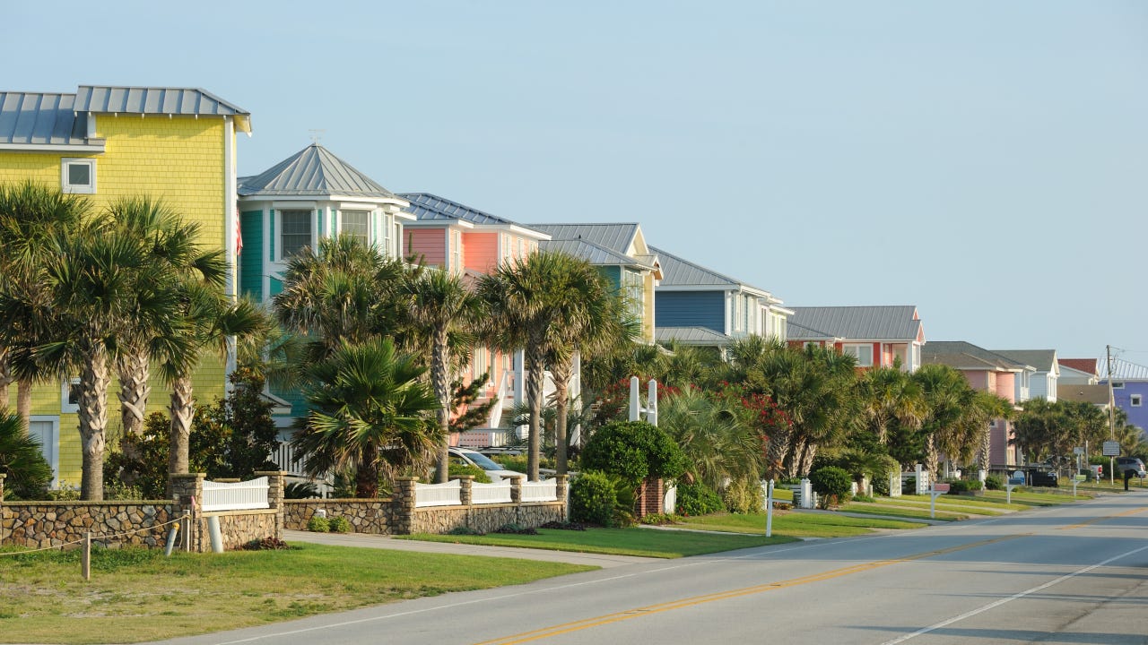 Row of brightly-coloured beach houses at Kure Beach, near Wilmington, North Carolina.