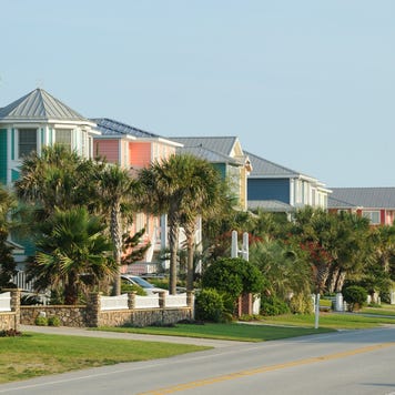 Row of brightly-coloured beach houses at Kure Beach, near Wilmington, North Carolina.