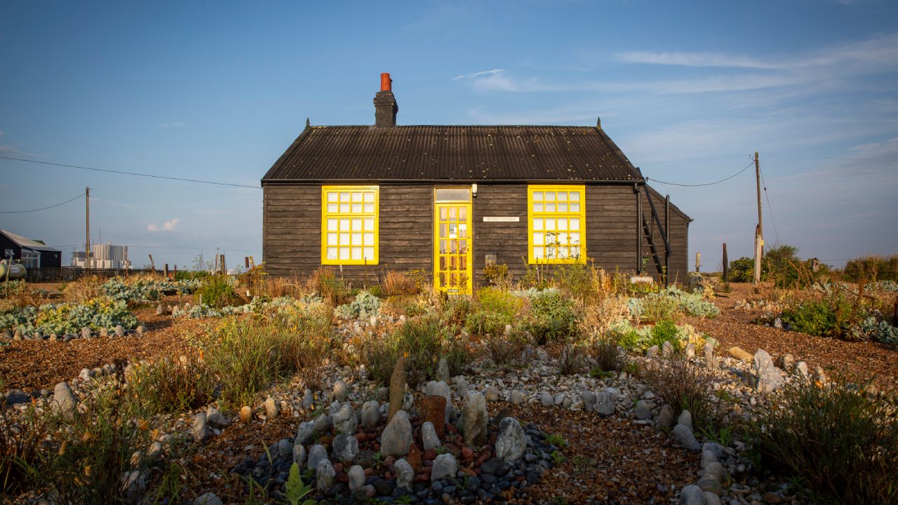 Prospect Cottage on a beautiful sunny mid summer morning, made famous by film maker Derek Jarman who found inspiration at Dungeness, where he created a shingle garden made from debris he found on nearby beaches on the 13th of August 2020 in Dungeness, Kent, United Kingdom. (photo by Andrew Aitchison / In pictures via Getty Images)
