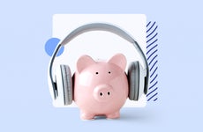 A piggy bank wearing headphones