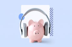 A piggy bank wearing headphones