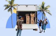 Family loading a moving truck with boxes