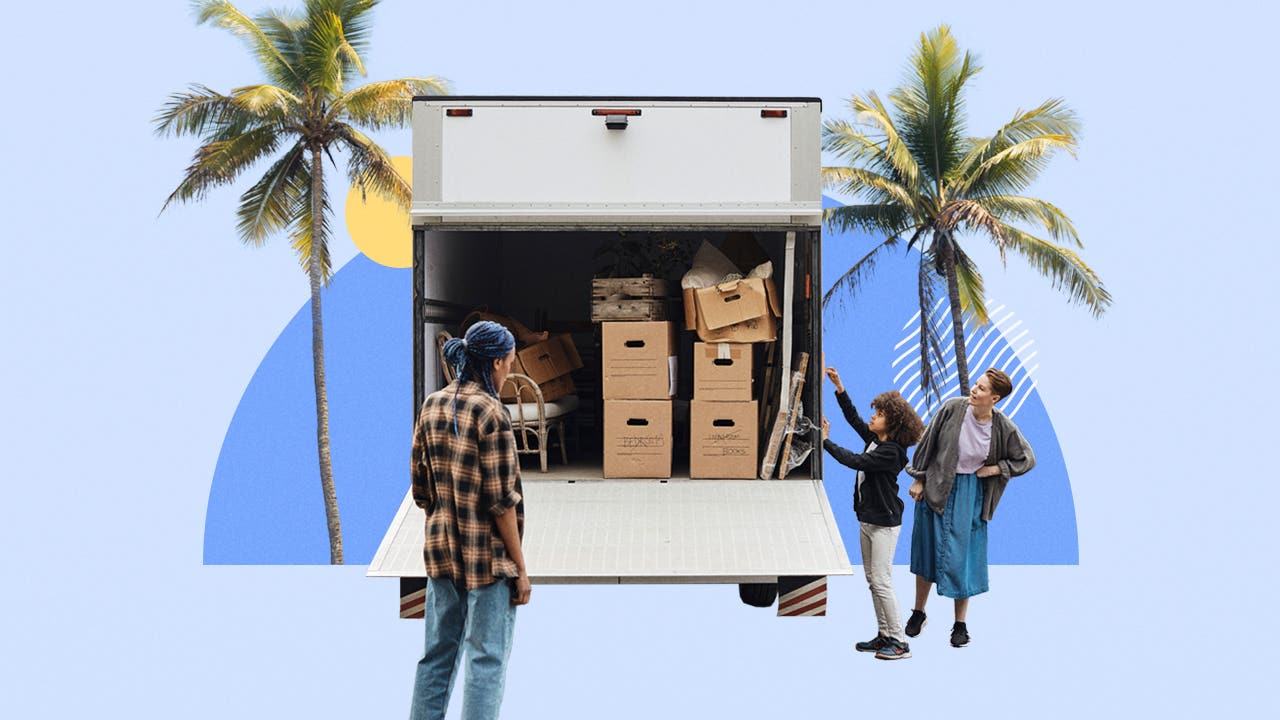 Family loading a moving truck with boxes