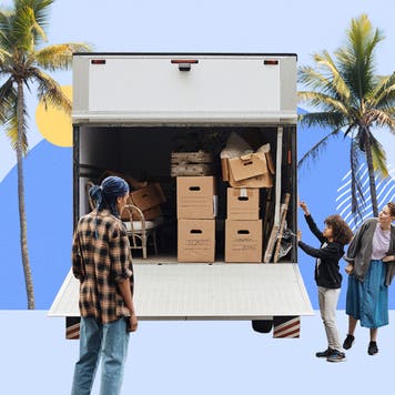 Family loading a moving truck with boxes