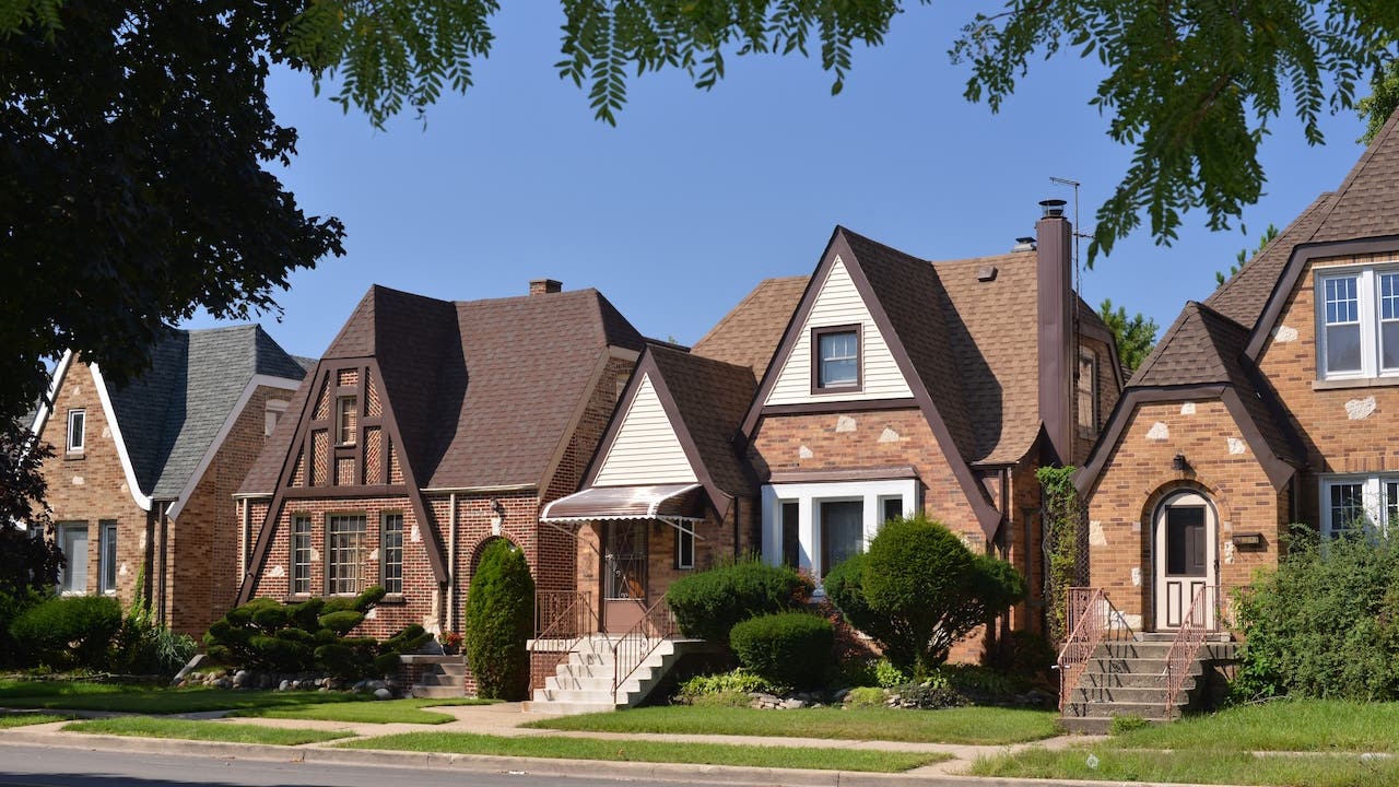 row of small tudor homes in suburban chicago