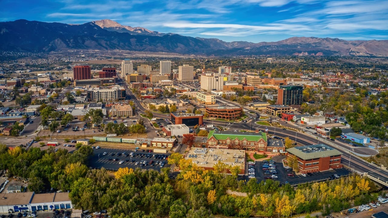 colorado springs with mountains in background