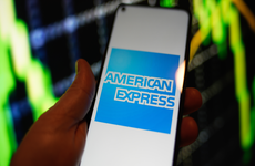 The American Express logo is seen on a Redmi phone screen in this photo illustration in Warsaw, Poland on 23 August, 2022.