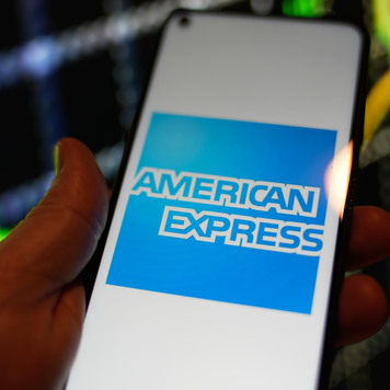 The American Express logo is seen on a Redmi phone screen in this photo illustration in Warsaw, Poland on 23 August, 2022.