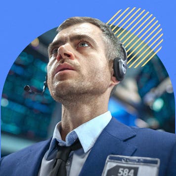 A trader on the stock exchange reacts with surprise