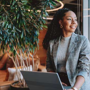 Business woman using laptop