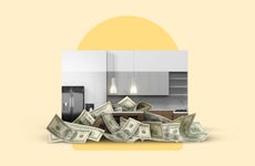 Image of money in front of a kitchen