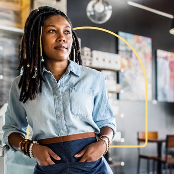 design image of a server with her hands in her pockets