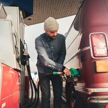 Man pumping gas