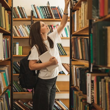 Female university student in library