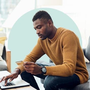 Person looking at credit card