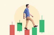 comically depiction of man walking up a candlestick chart