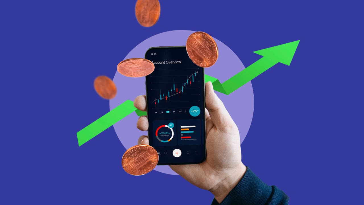 close-up of hand scrolling through financial data