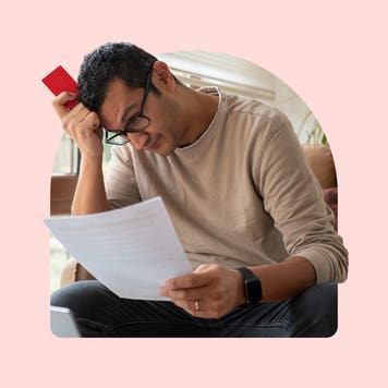 Person reading credit card statement