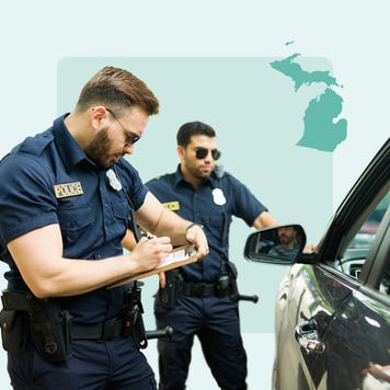Cops writing a speeding ticket