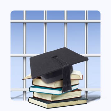graduation cap on top of stack of books, all in front of a set of prison bars