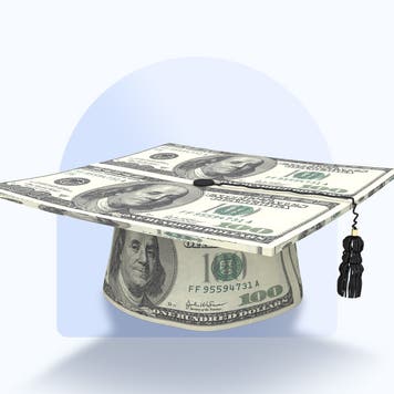 graduation cap wrapped in hundred dollar bills