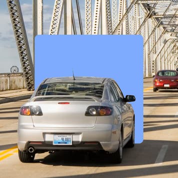 Car driving on a bridge