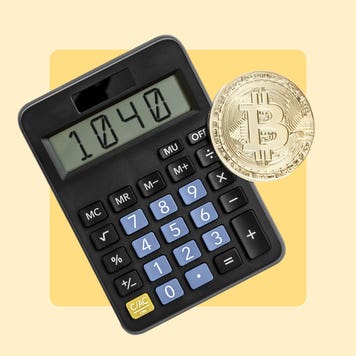 Calculator next to an illustration of a Bitcoin token.