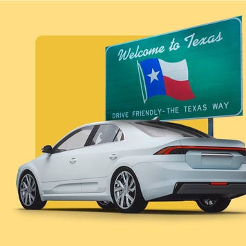 A car parked in front of a Texas sign