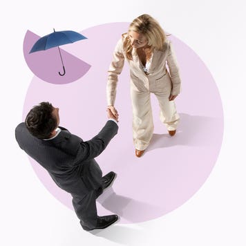 Two people shaking hands.