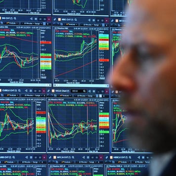 A trader works on the floor of the New York Stock Exchange