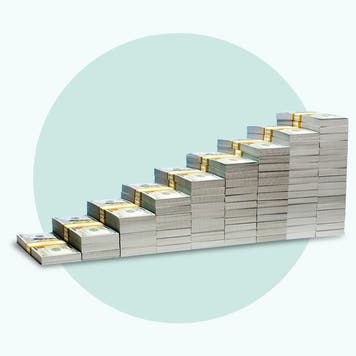 A stack of cash arranged to resemble a staircase set against a solid green background.