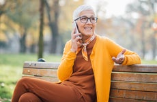 Older woman sitting in the park