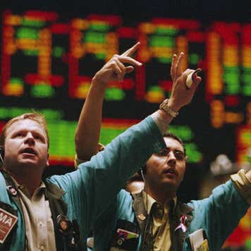 People on a stock trading floor.