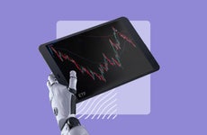 Robot arm holding a tablet with financial graphs