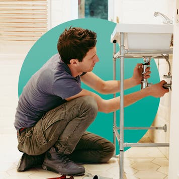 Person doing plumbing