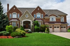 exterior of large nicely landscaped suburban house