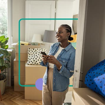 Woman happily looking around her home