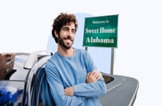 Driver leaning against their car in Alabama