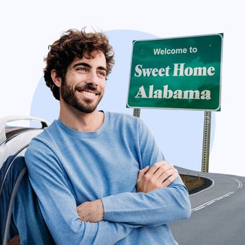 Driver leaning against their car in Alabama