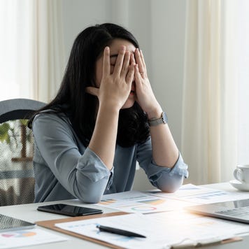 Tired stressed businesswoman