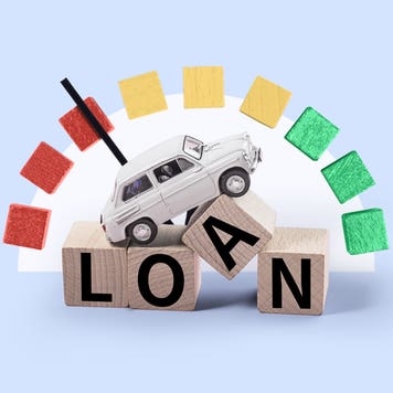 An image of a white sedan on top of blocks that spell out "loan." Above it, there is a fuel gauge monitor.