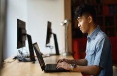 Young man working in a co-working office